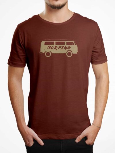 Man wearing a burgundy T-shirt with a beige surf-van graphic and the word SURFING printed on the chest.