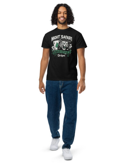unisex-sports-tee-black-front-6a544311dccbfjpg Full-body shot of a man wearing a black graphic T-shirt with a tiger design and 'Night Safari' text, jeans, and white sneakers against a white background.