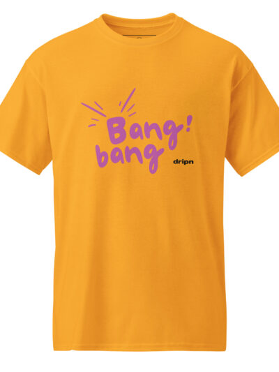Bright orange T-shirt with a bold purple 'Bang bang' graphic on the front and a small black logo near the hem.